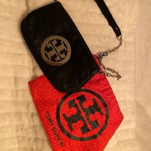 Tory Burch leather cross body / clutch .
